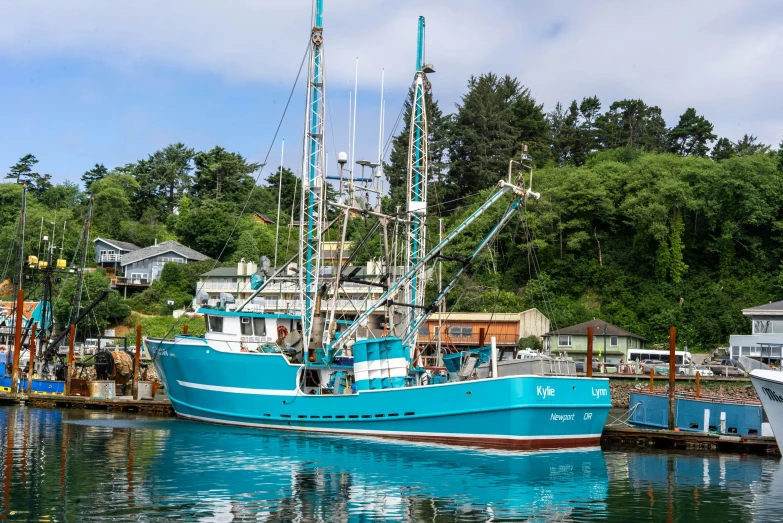 boats docked in a harbor on a sunny day