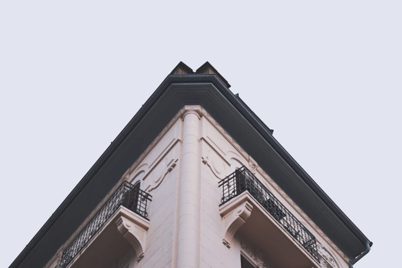 the balcony and upper levels of a house