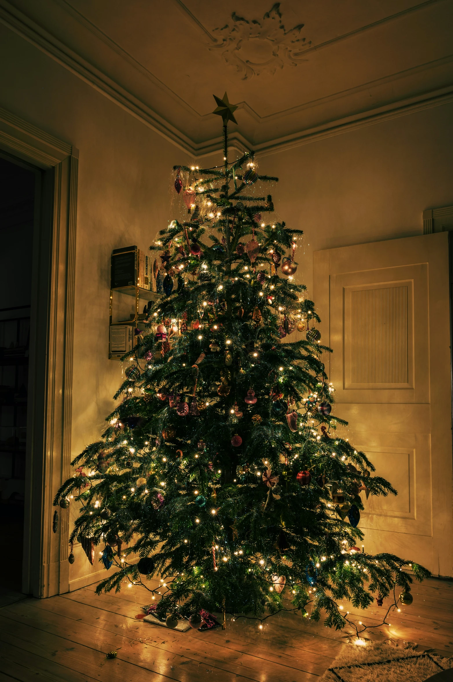 a decorated christmas tree in a living room