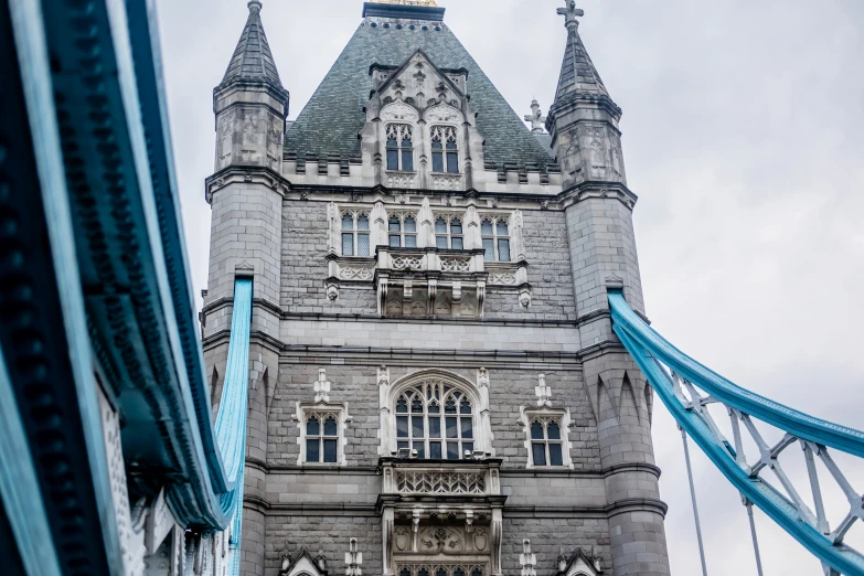 the top of a very tall bridge with a tower