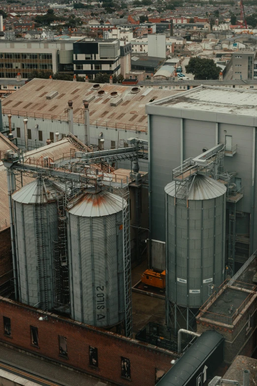 a building has several large tanks and pipes on the top