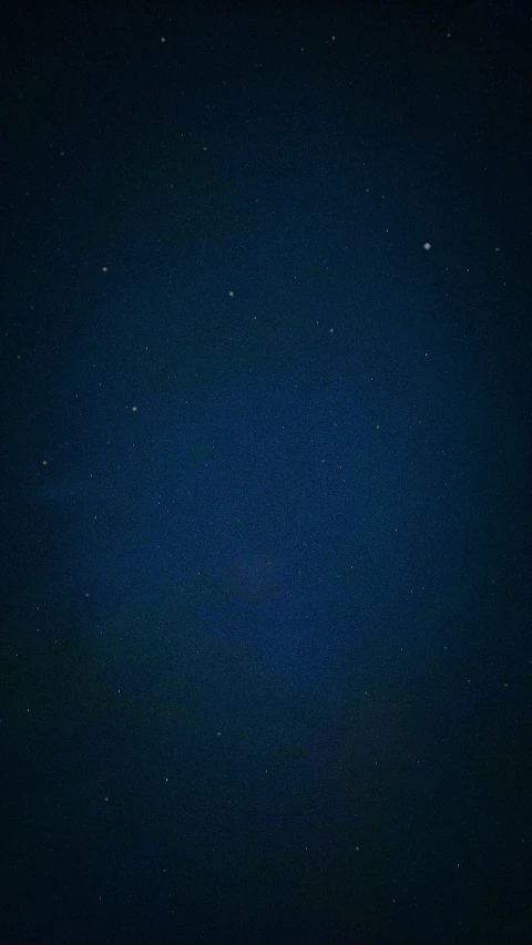 an image of the night sky as seen through a telescope lens