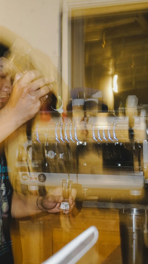 an attractive young woman drinking from a wine bottle