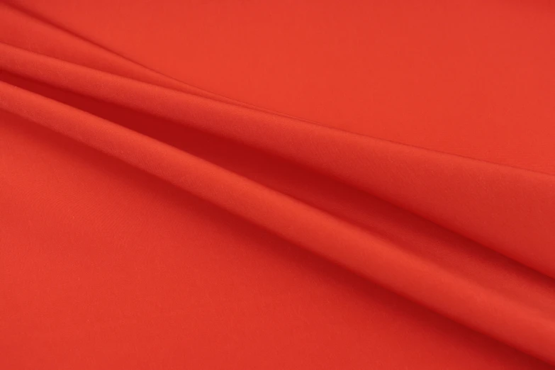 red fabric close up with slight folds