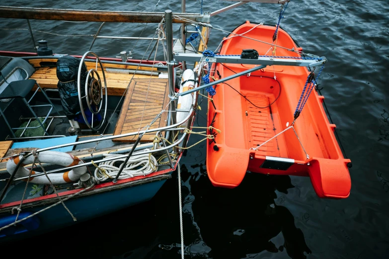 two boats docked in a body of water