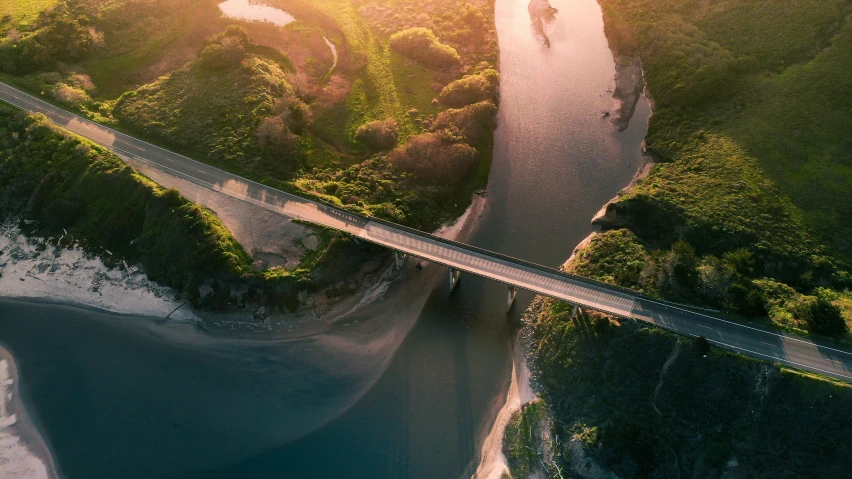 an aerial view of a large bridge over water