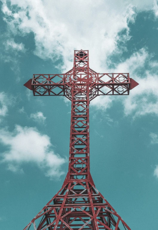 a tall metal tower under a blue sky