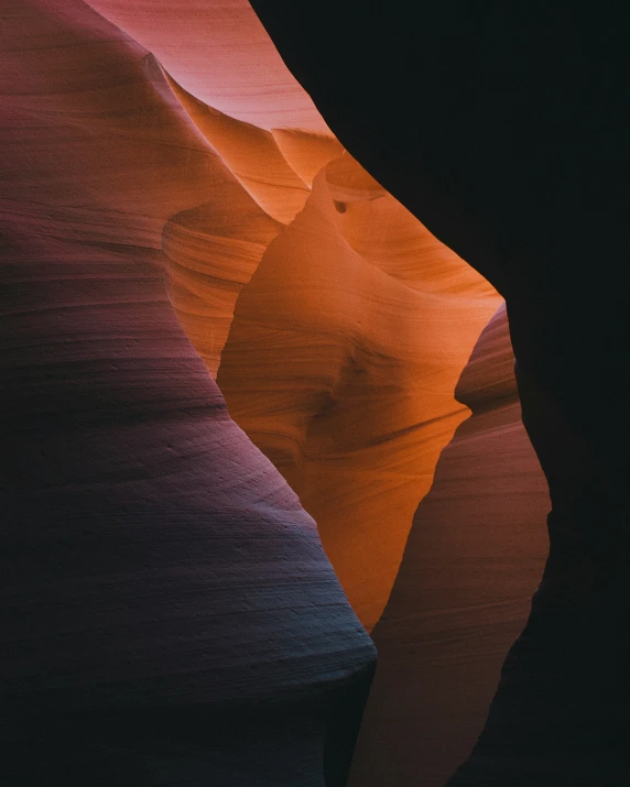 a beautiful orange and pink light falls from the sky