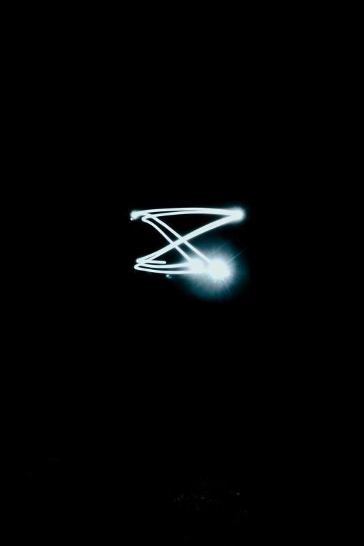 blurry pograph of an airplane in the dark