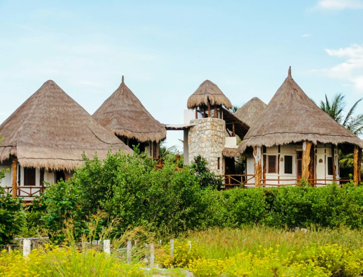 several huts in an african village are seen in this picture