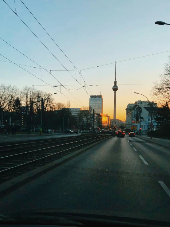 the road in the city is full of cars