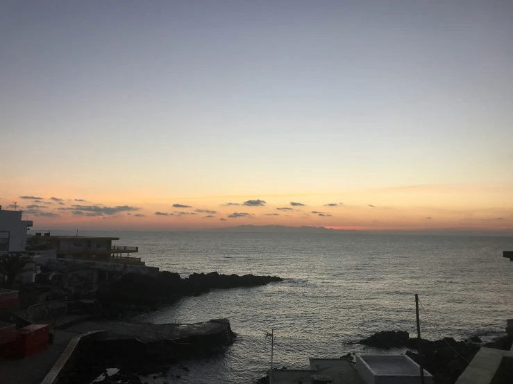 a view of the ocean from the cliff side