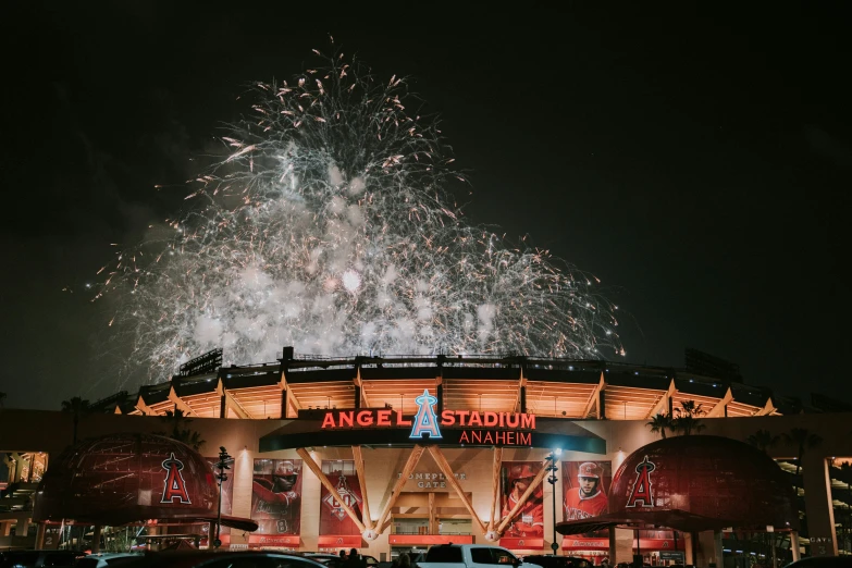 a huge fireworks over the top of a stadium