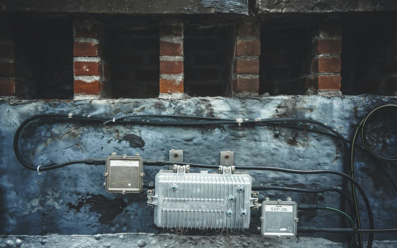 a wall of wires is shown with electrical equipment