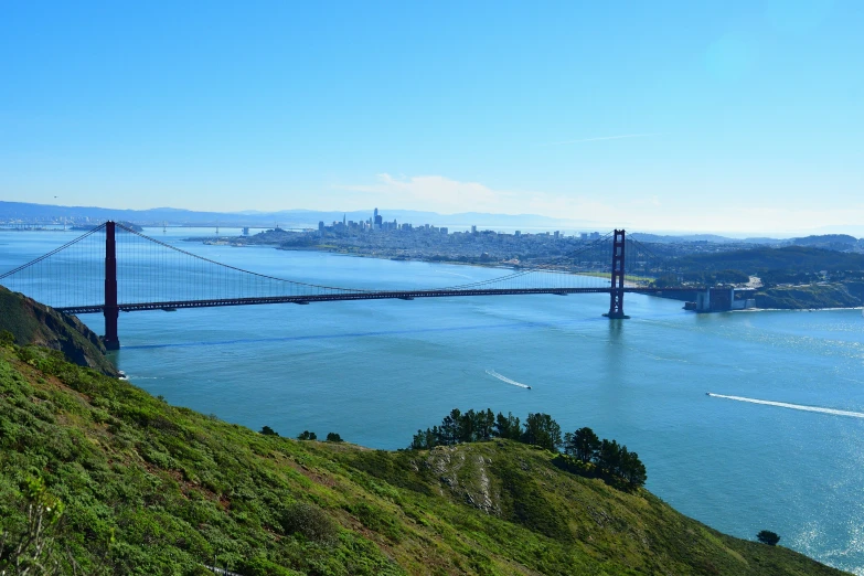 a large bridge that is across a long body of water