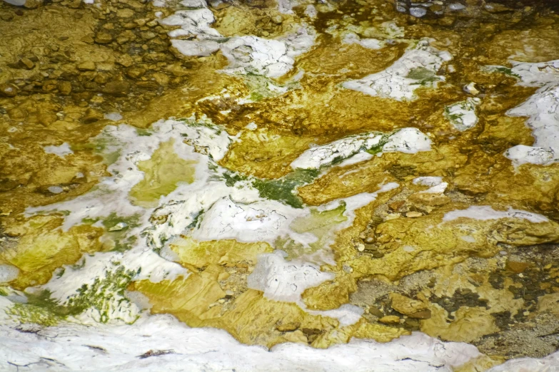 an unusual mixture of snow and rock with small bubbles