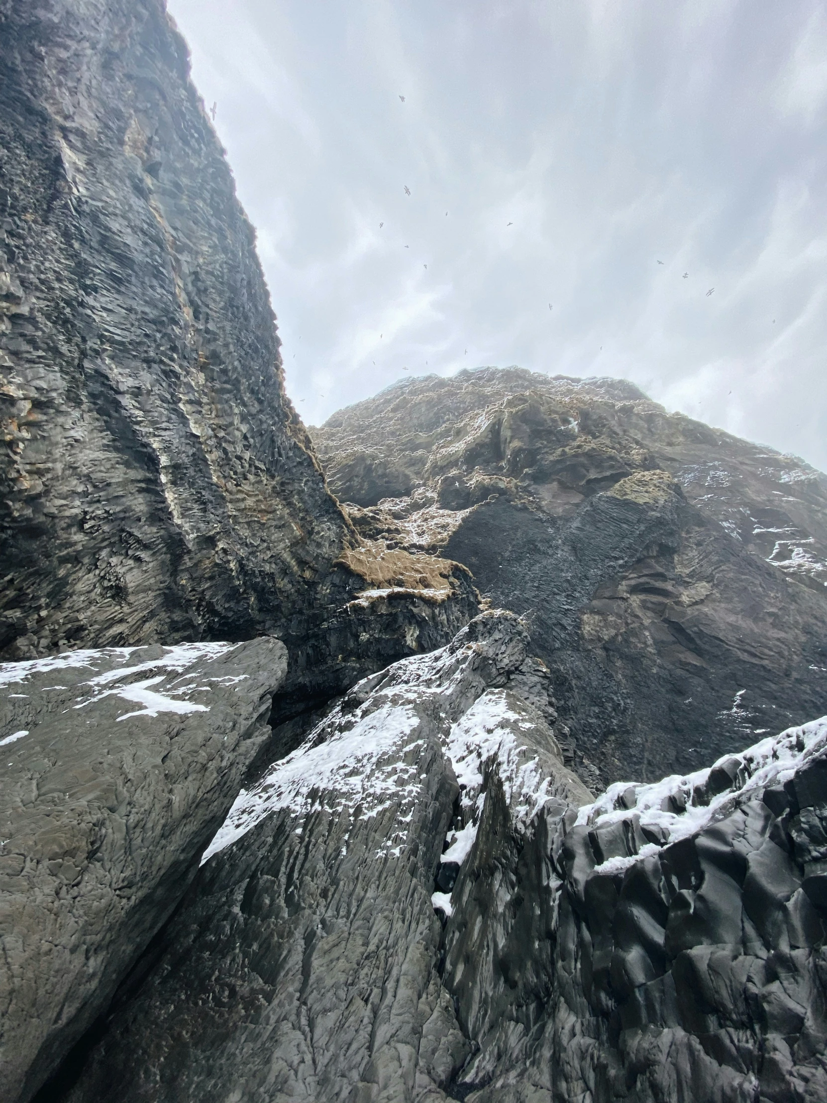 a large mountain with snow on the mountains