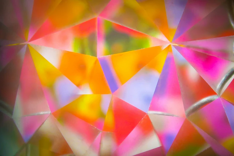 an abstract design with geometric shapes made of colored shards