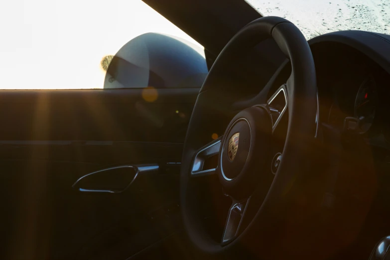 a steering wheel on the dashboard of a car