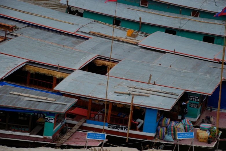 several houses near each other on stilts