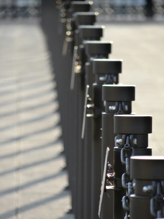 the railings are lined with ckets and chains