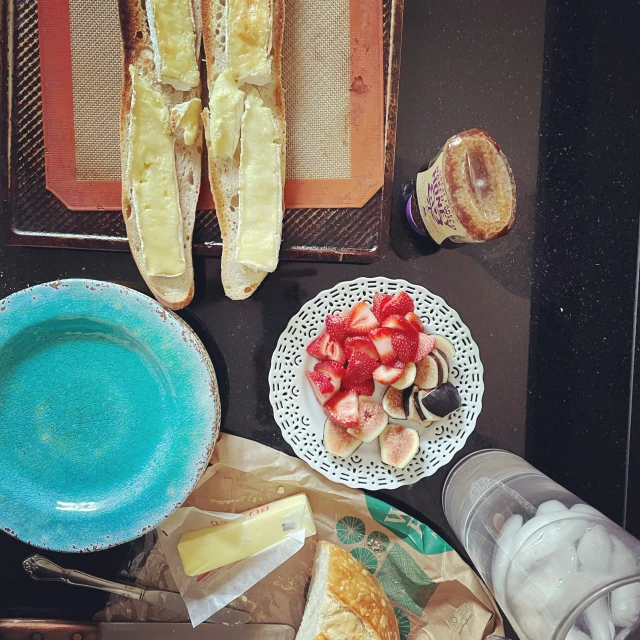 plates and containers of food on a table