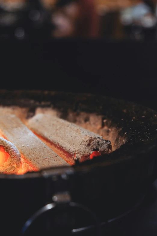 a close up view of food cooking in a set