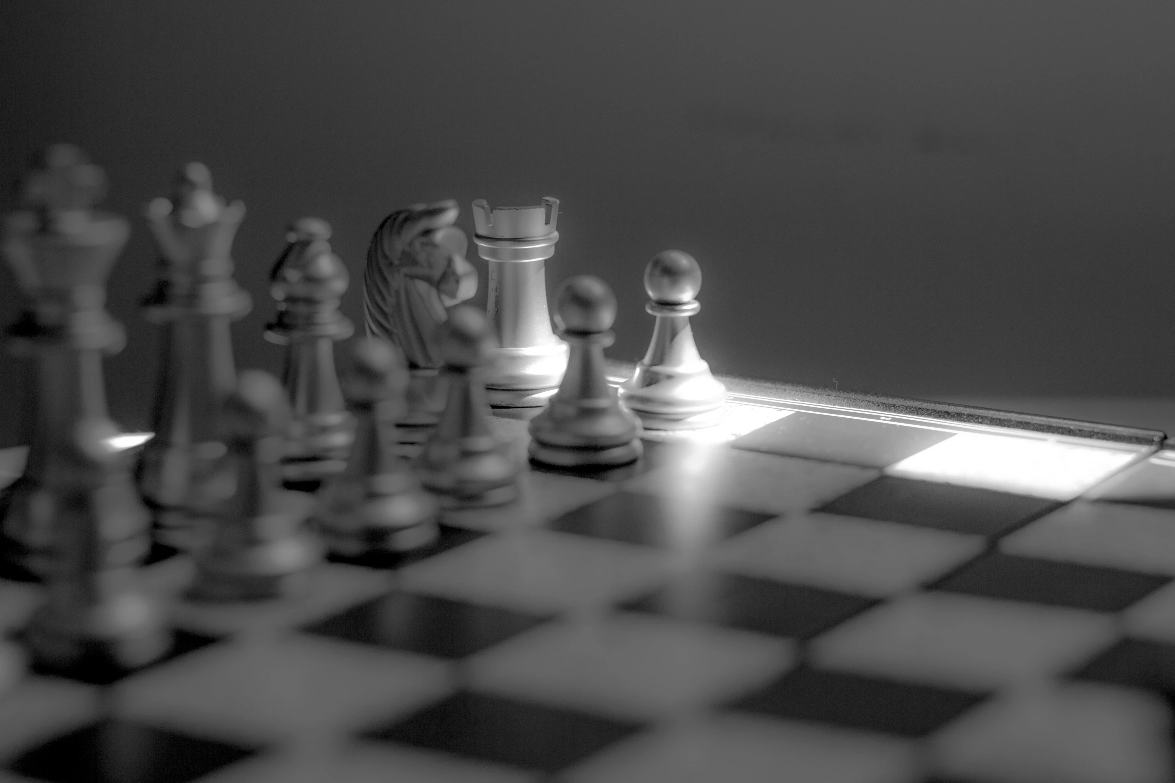 a black and white po of the king on a chessboard