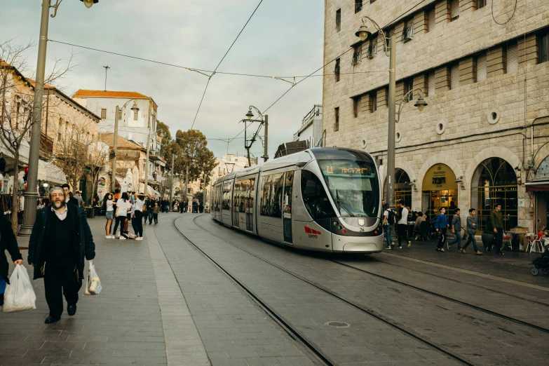 a commuter train pulling into a train station