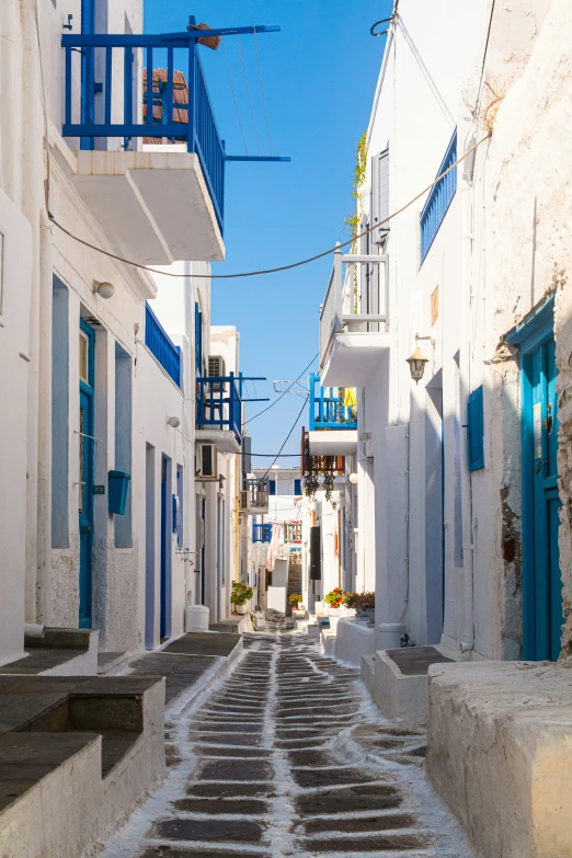 a street that is lined with white building