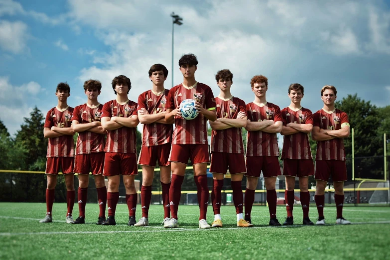 a soccer team is posing for a picture