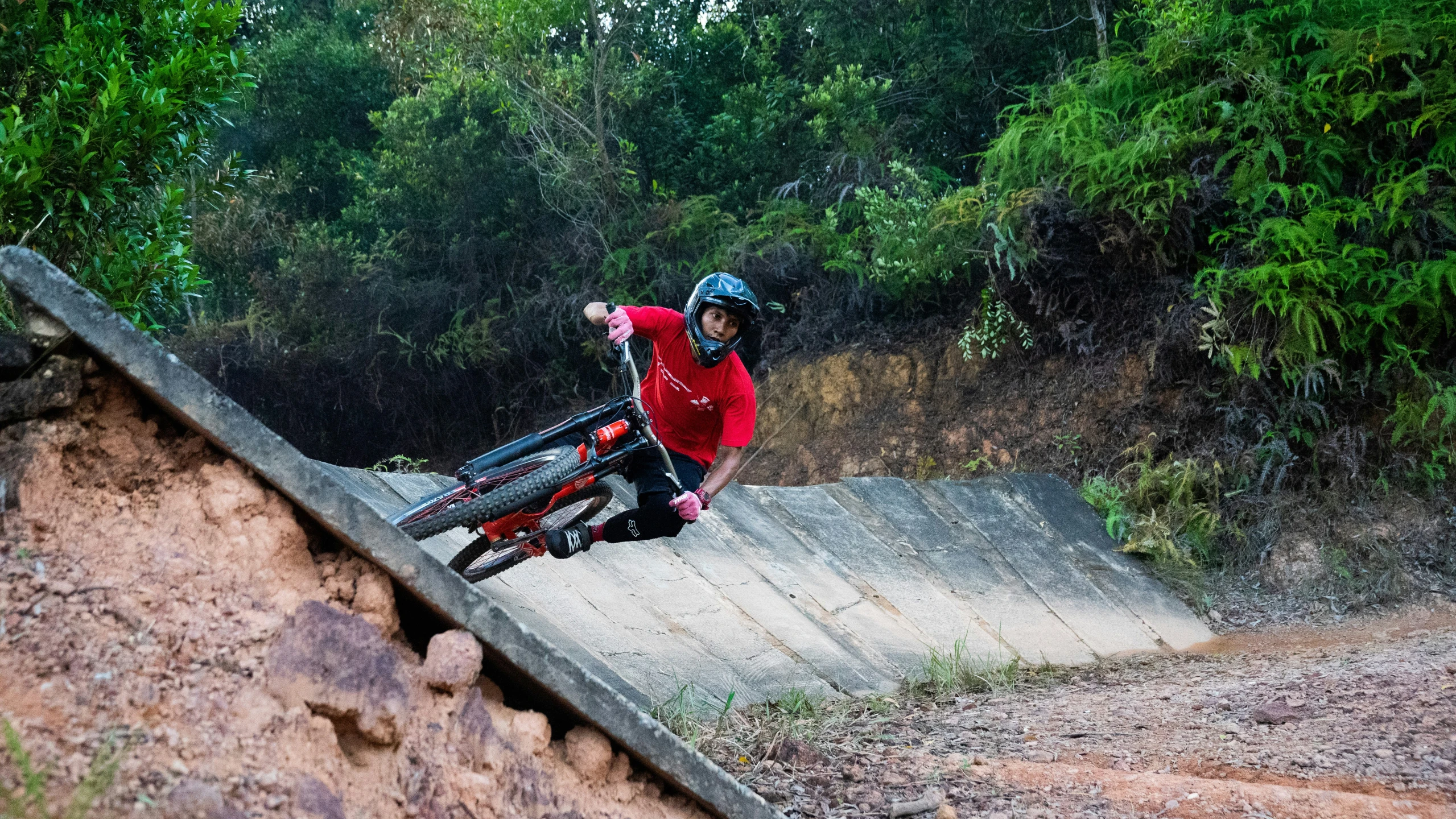 a man is doing tricks on his bike