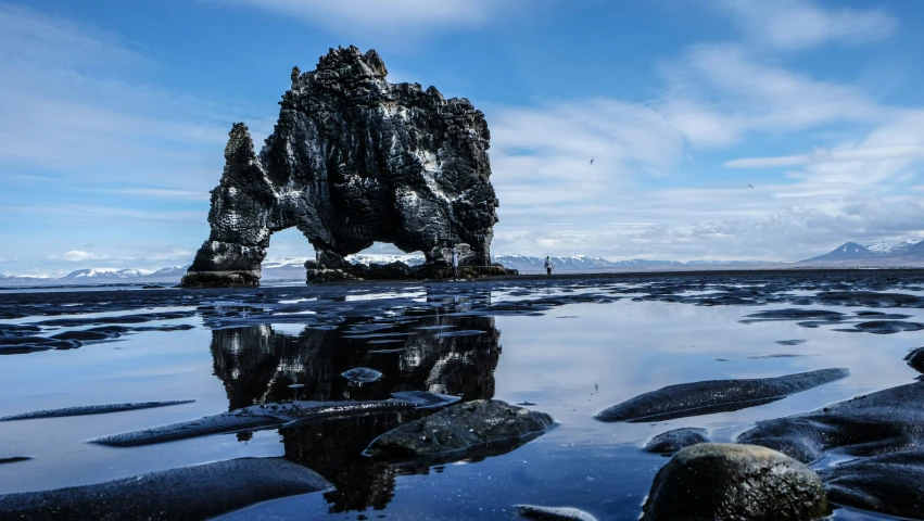 a rocky, flat area with low lying water