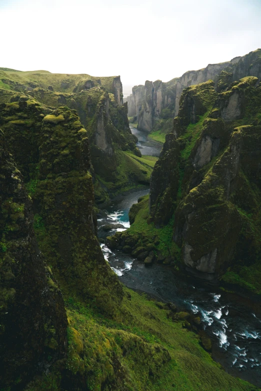 the river flows into the rock outcroppings