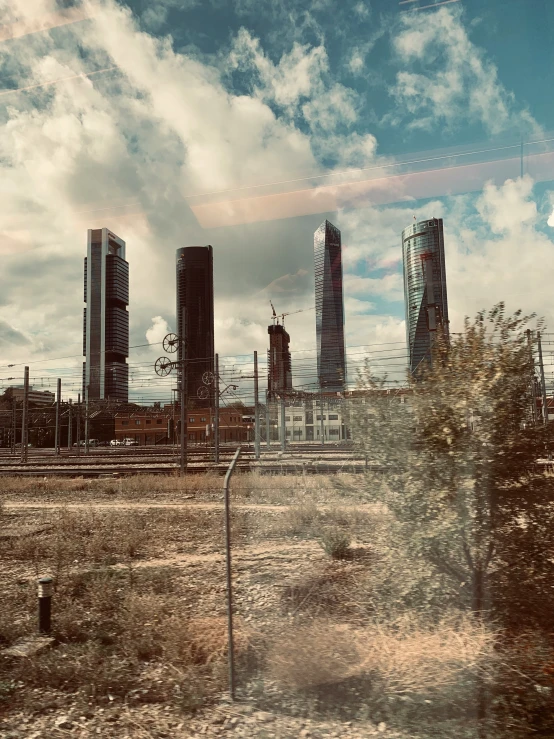 a distant view of the city is seen through the window