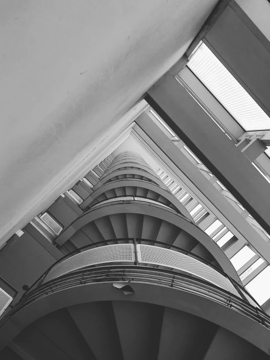 a very tall building with a very pretty spiral staircase