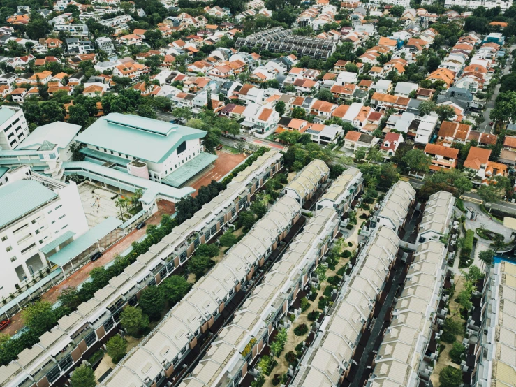 overhead s of multiple trains near a building