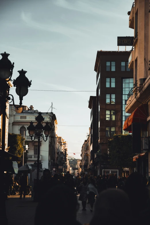 a busy street filled with lots of buildings