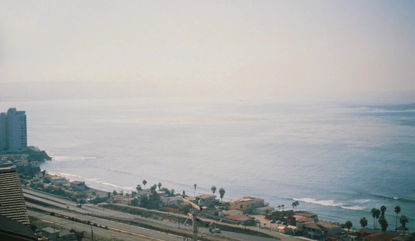 the view of a ocean from the top of a building