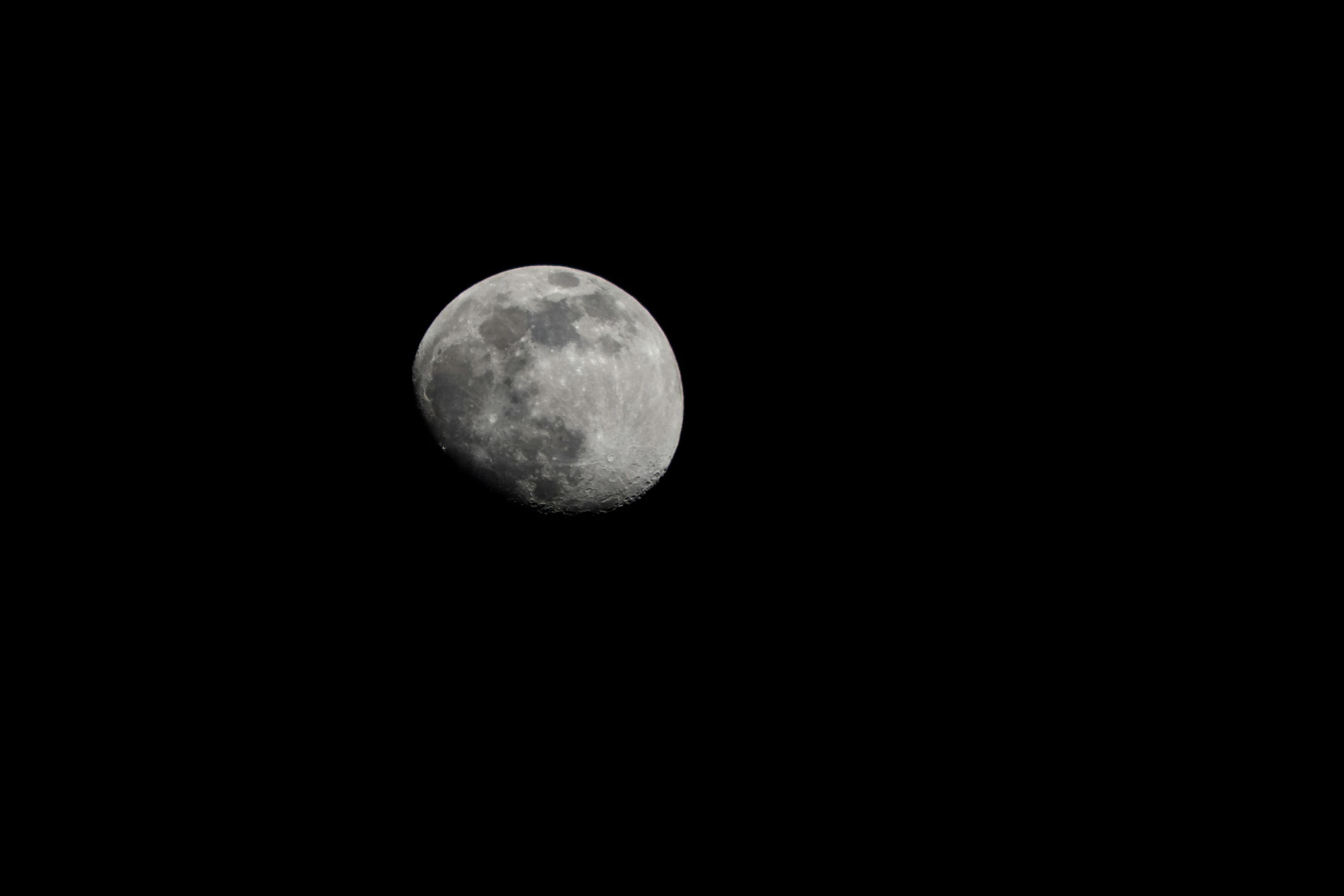 the moon in the night sky during the night