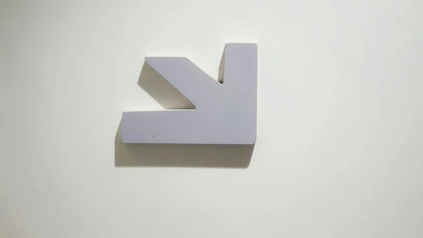 a picture of the letter k made from cut paper