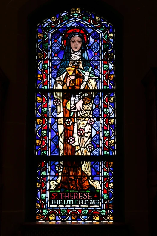 a large stained glass window in a building