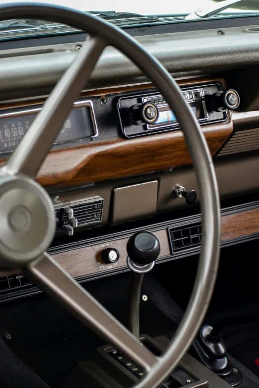 a steering wheel and dashboard area in a car