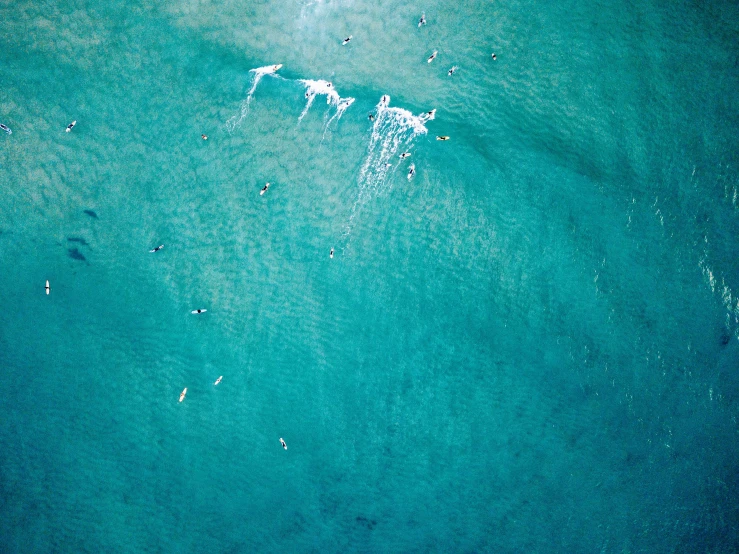 the sky is blue and is far above, with a small boat floating in it