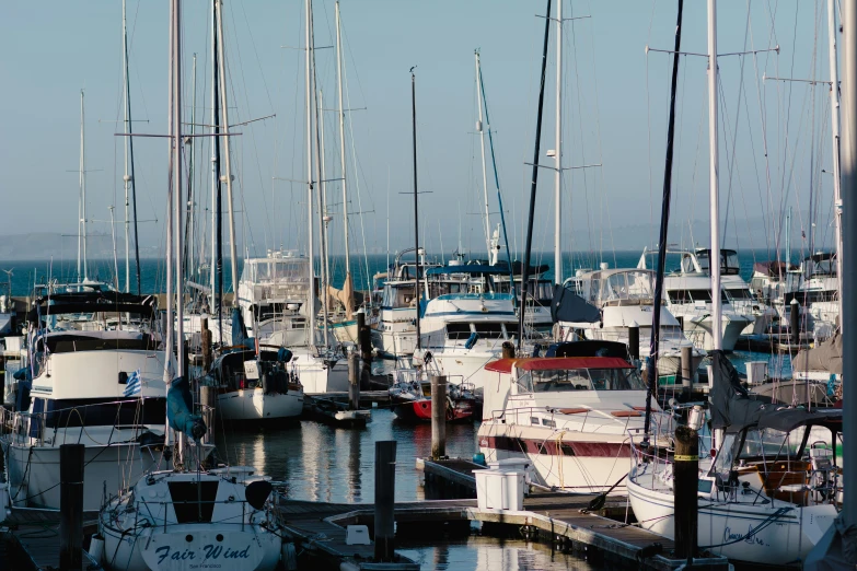 an ocean filled with lots of white boats