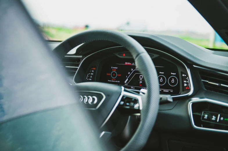 the dashboard and instrument display inside a car