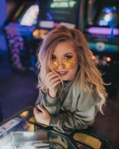 girl in a gold shirt in a casino
