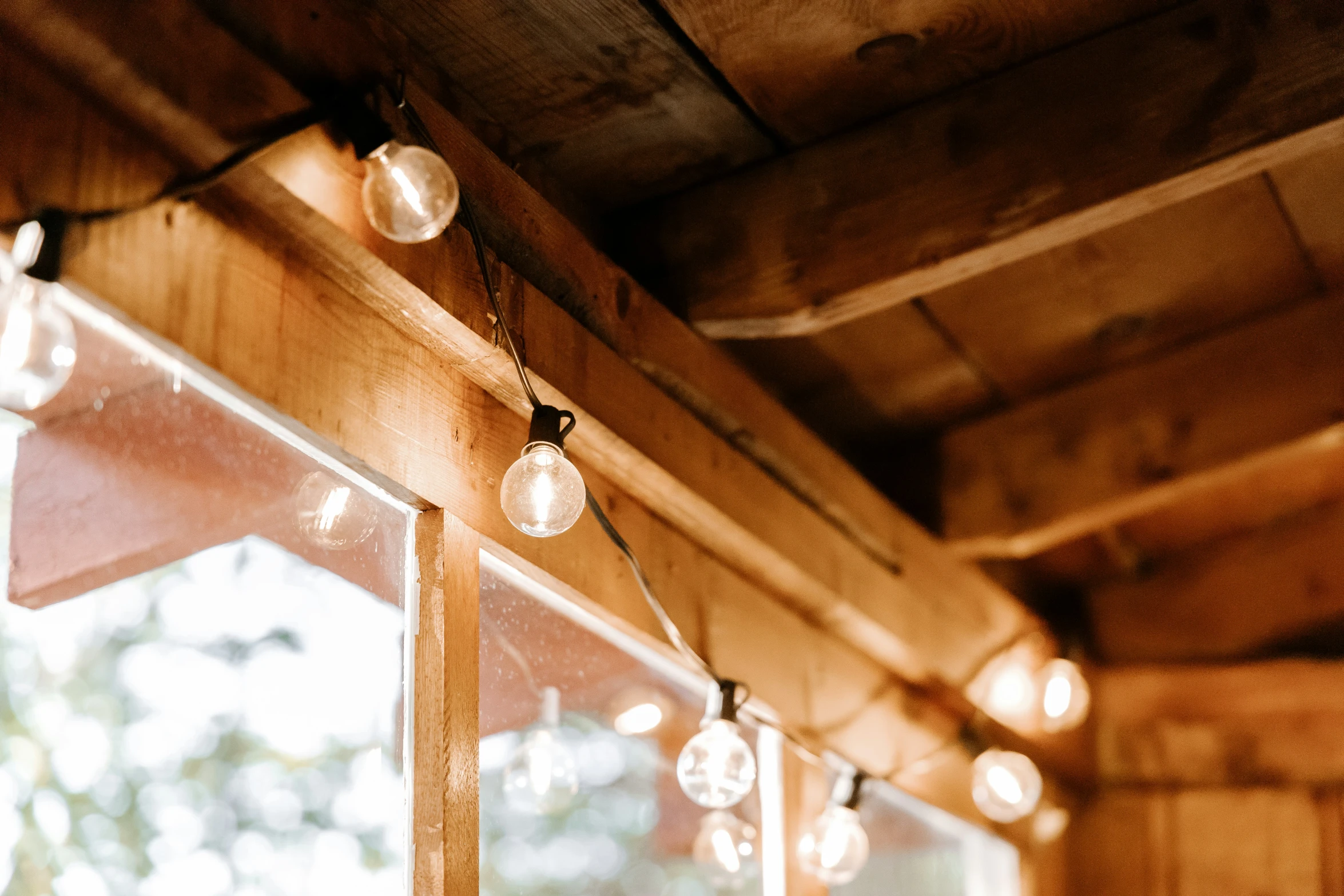 a building with some lights hanging from the side