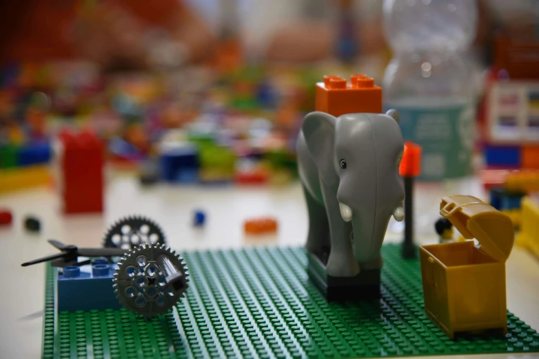 a close up of lego toys near lego figures and equipment