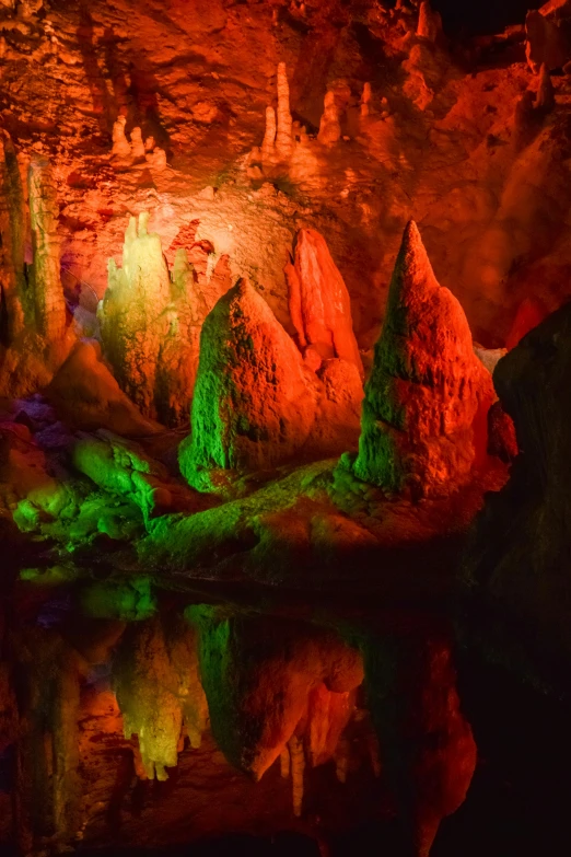 the lights on the caves are reflecting in the water